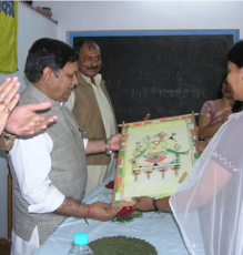 Sanidhya - Official inspecting traditional artwork